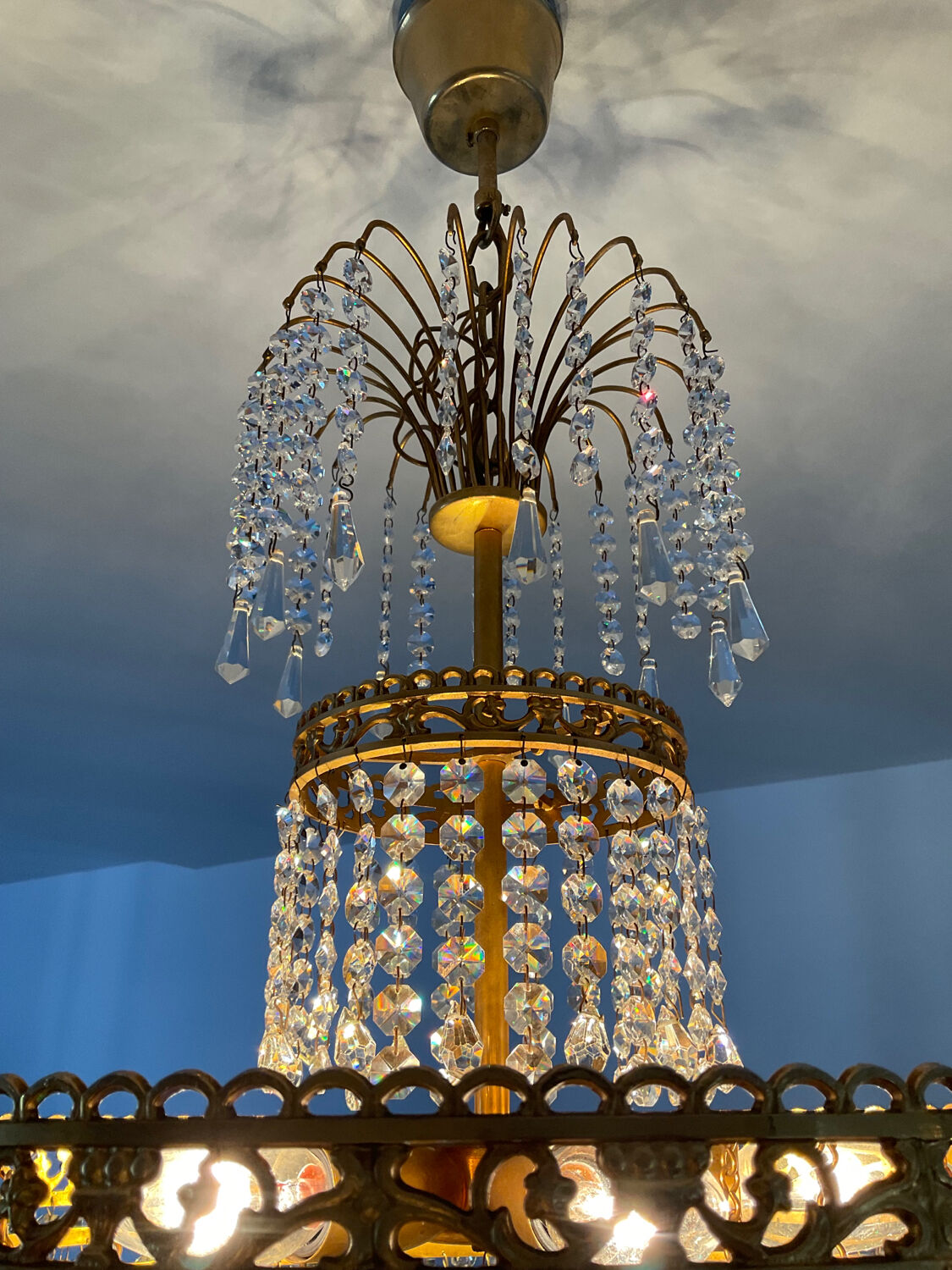Cascade chandelier with crystal and bronze tassels