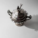 Vintage 1930s silver-plated footed bowl with lid by Warren Rogers New York, featuring a bird motif and ornate details.