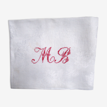 Serviette de table damassée monogrammée mb en rouge