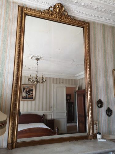 Miroir doré ancien de style Louis XV