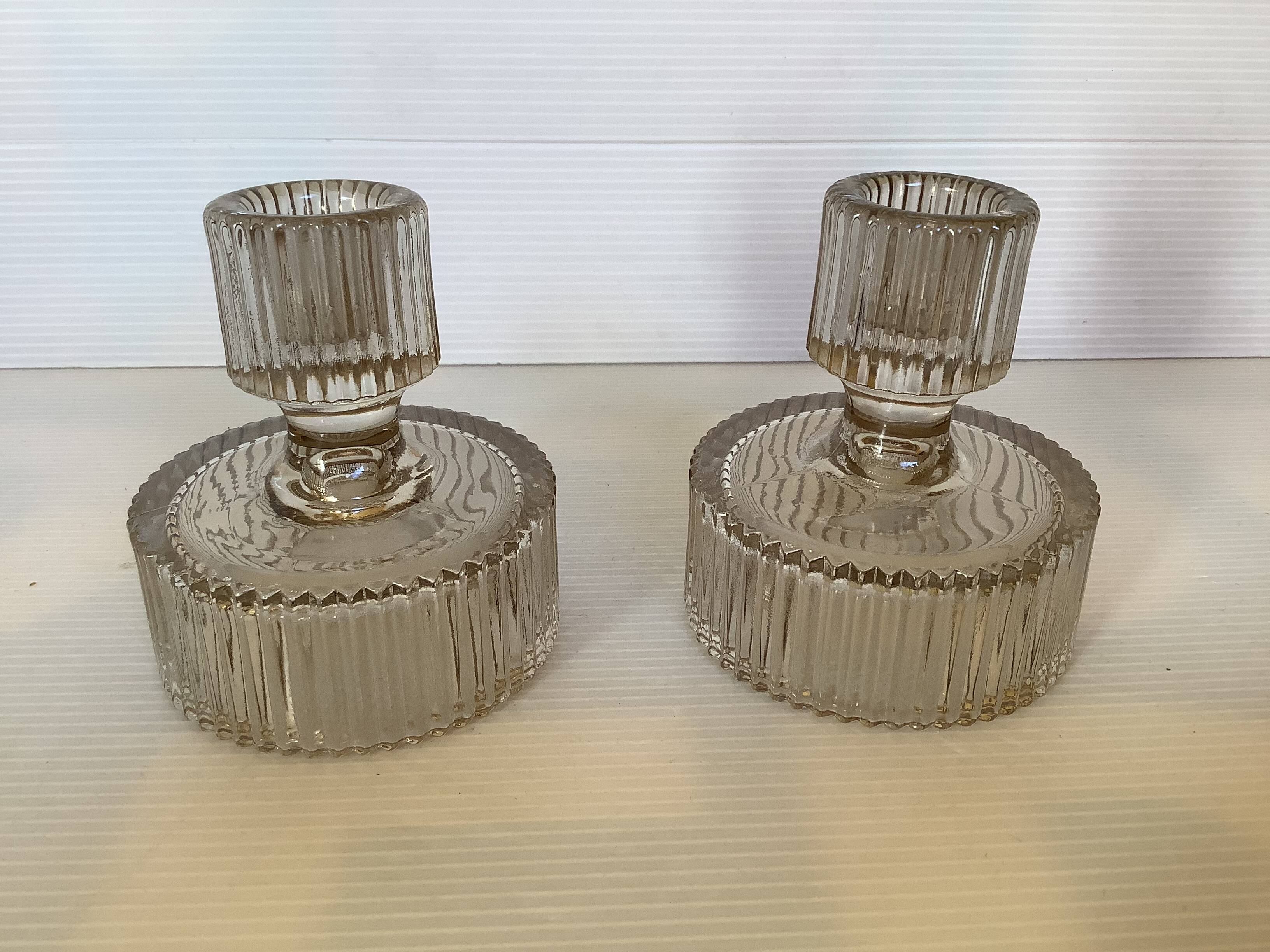Pair of ribbed molded glass candlesticks