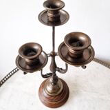 Pair of antique wooden and brass candlesticks