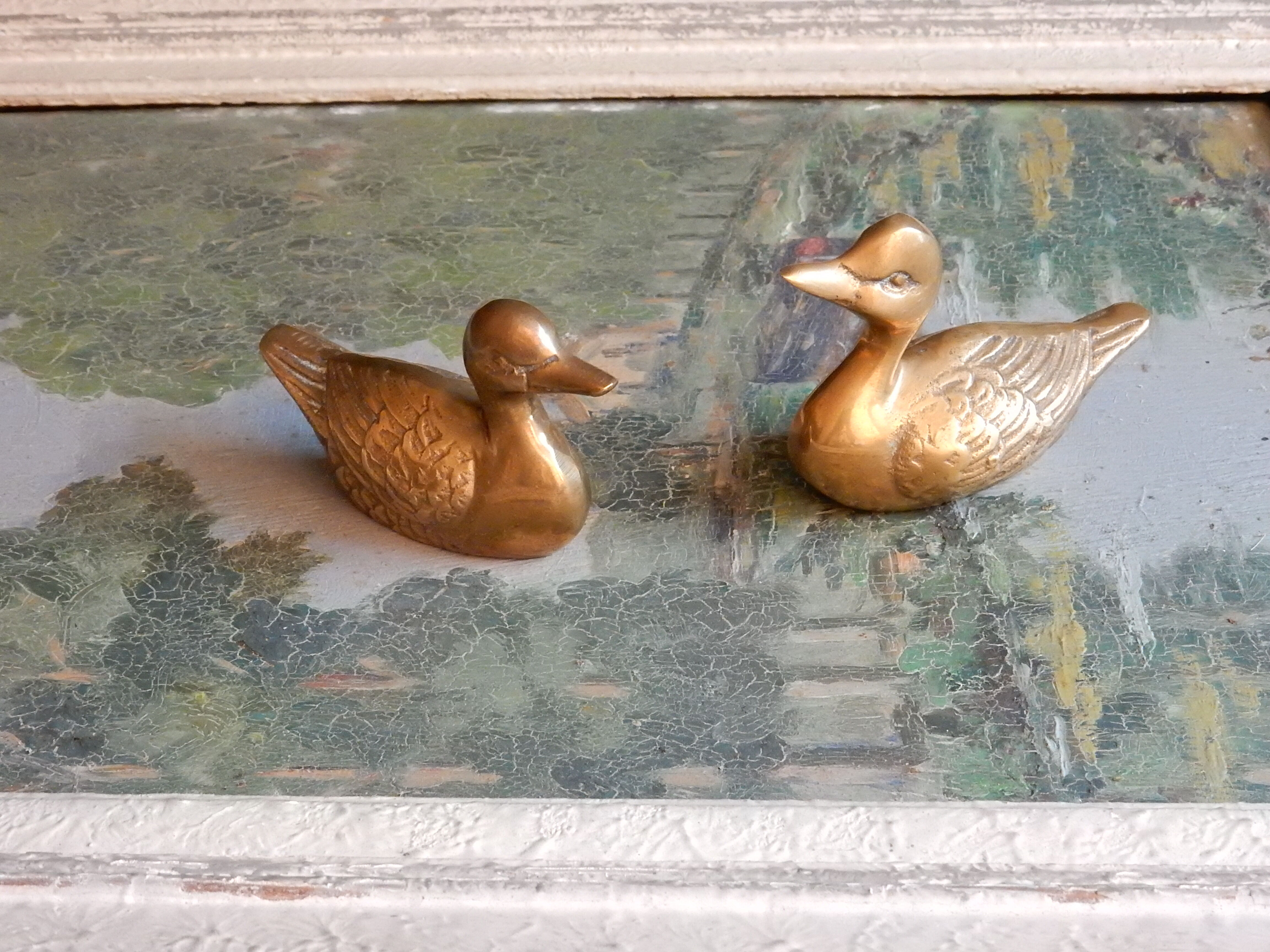 Couple of brass ducks