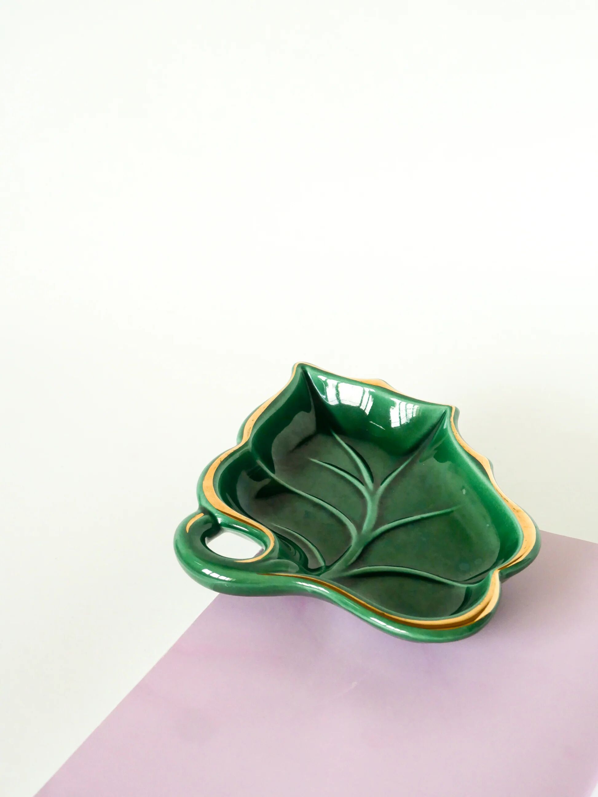 Leaf-shaped earthenware catchall, green and gold, 1970.