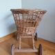 Wicker rattan doll cradle with wheels