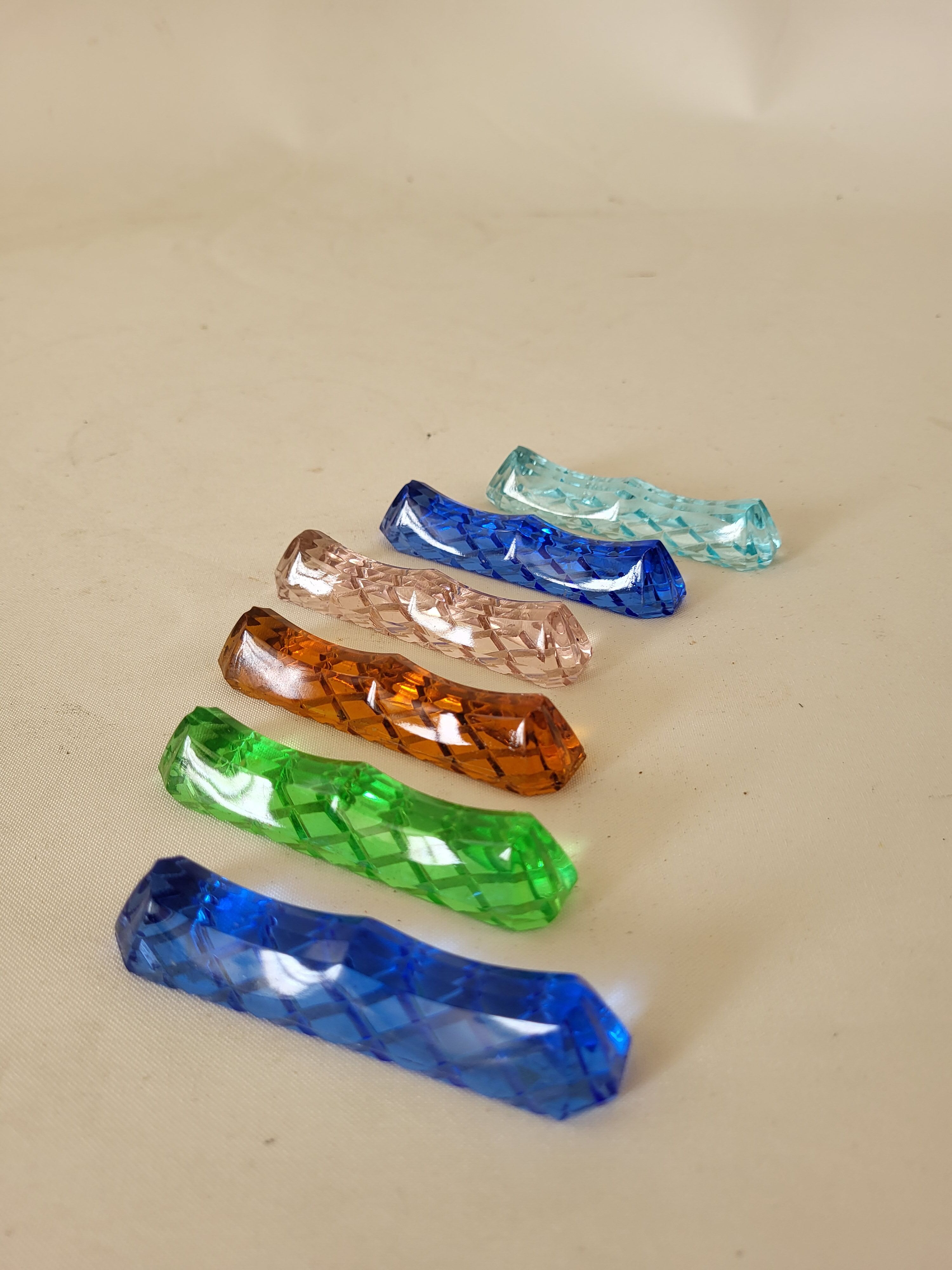 6 glass knife holders of colors