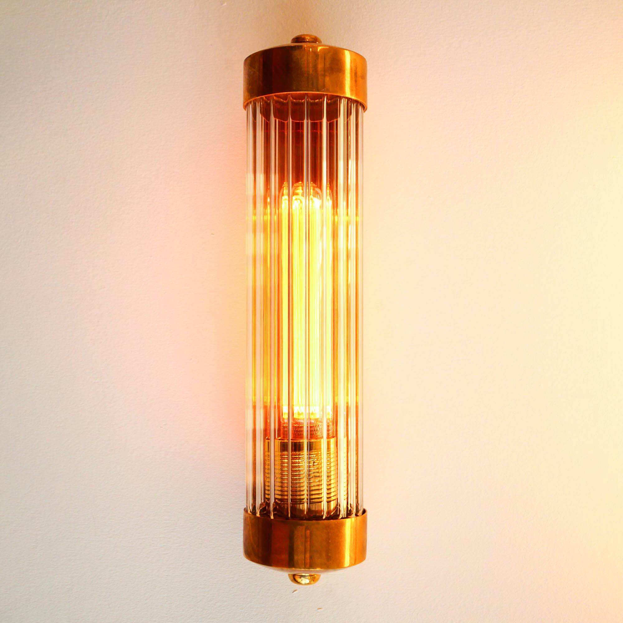 Cylindrical wall light with streaked glass and brass