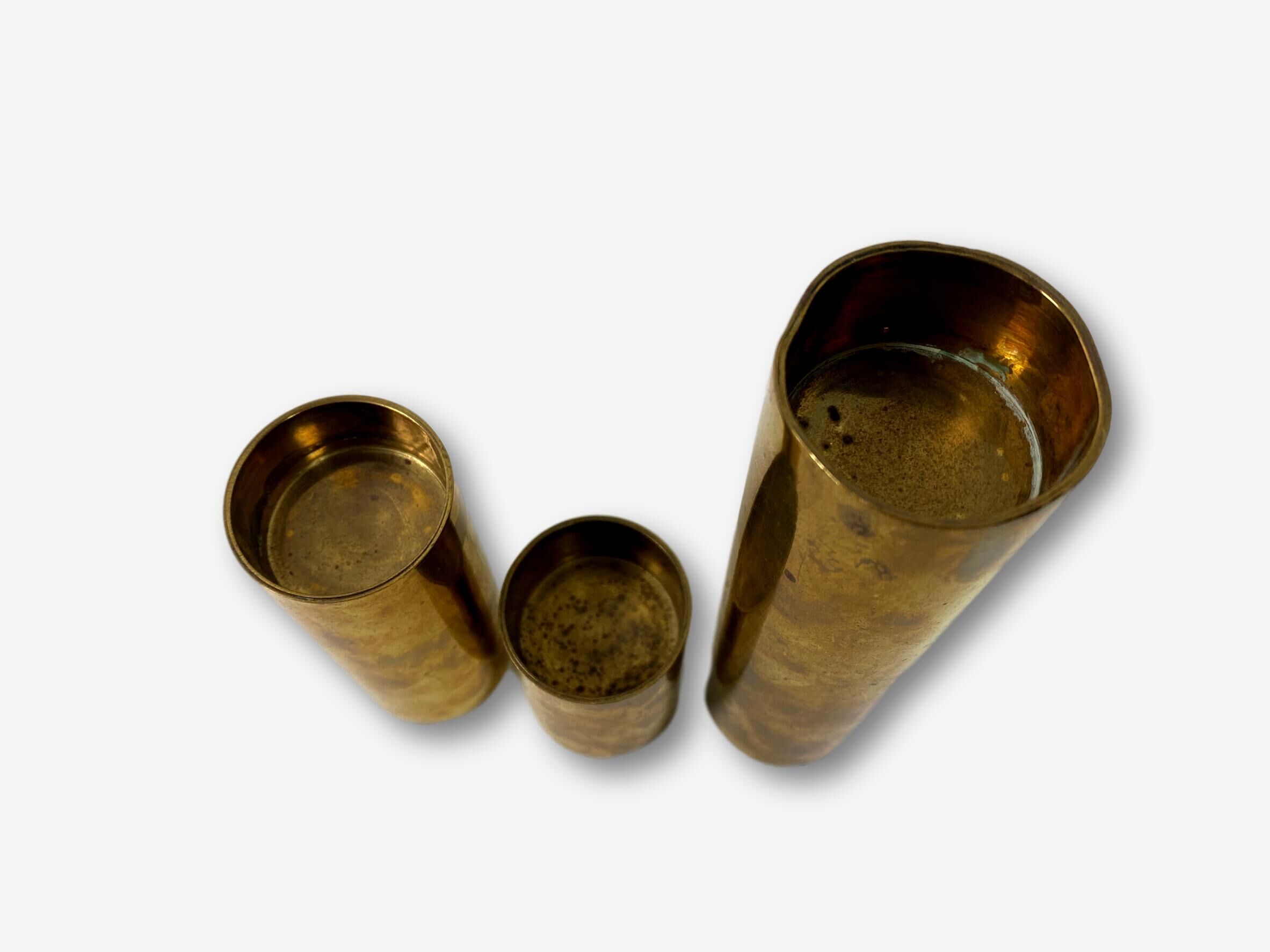 Set of 3 brass candlesticks