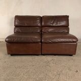 A pair of leather armchairs, Switzerland, 1970s