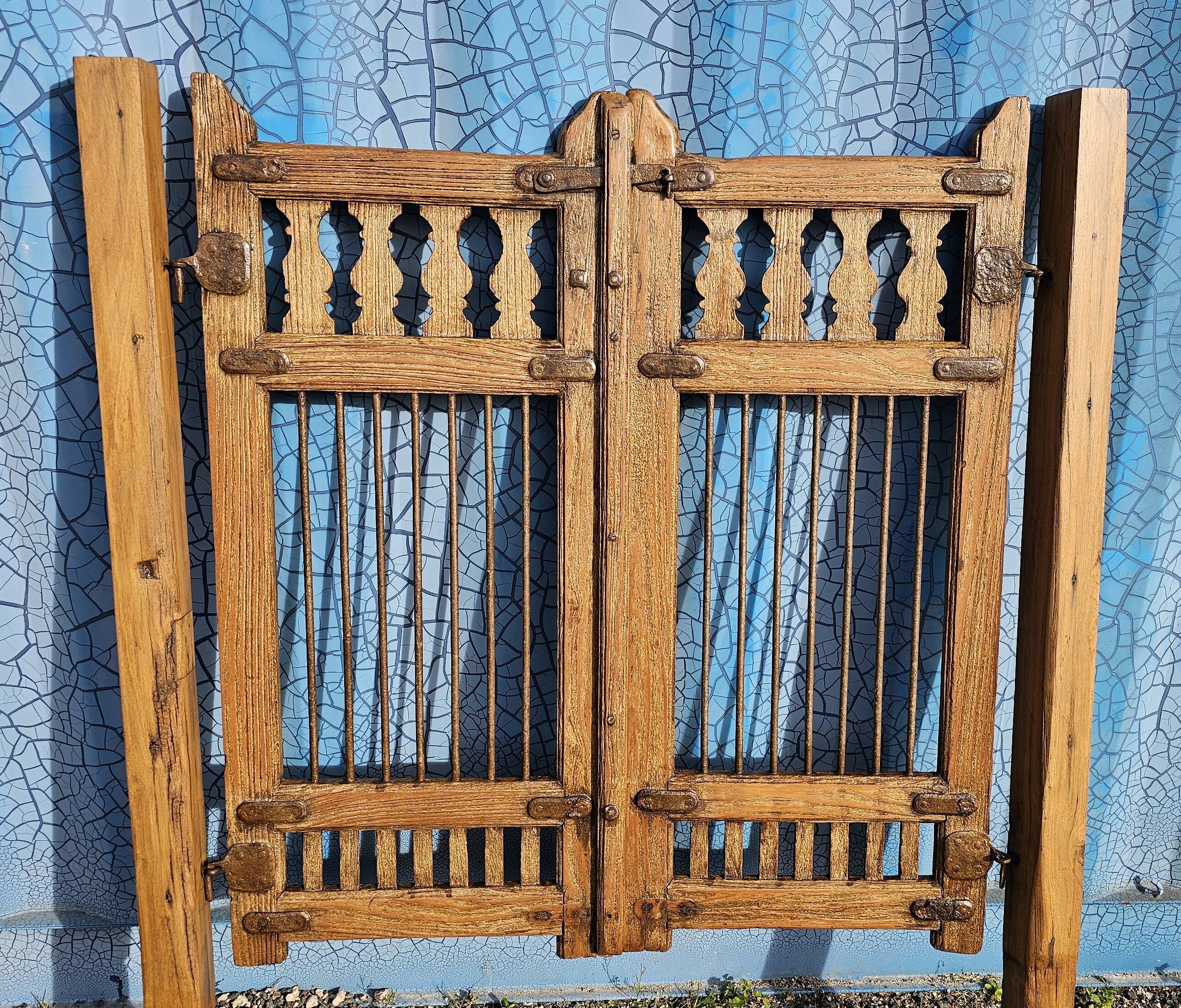Old garden gate in solid teak