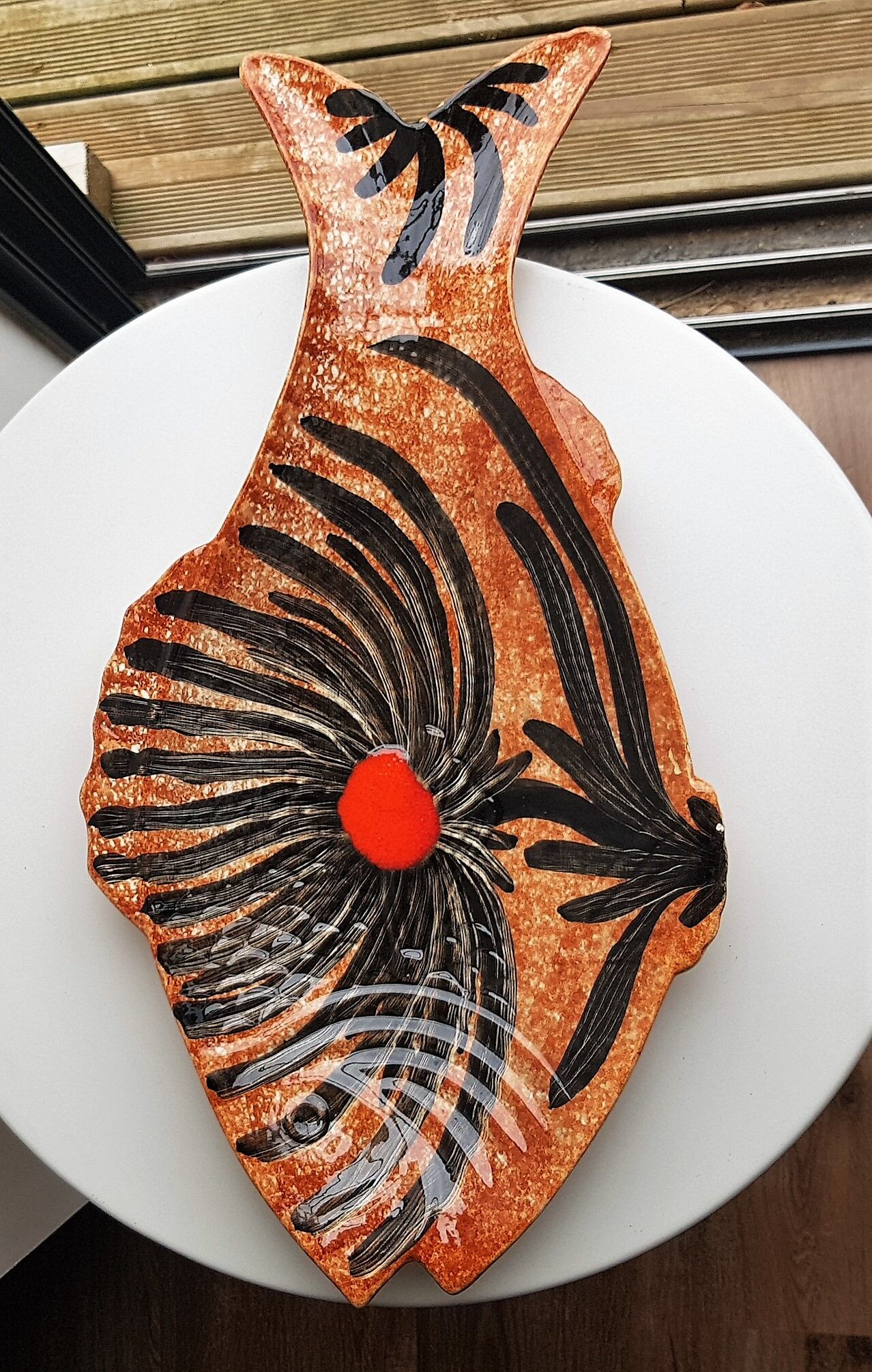 Ceramic dish in the shape of a fish.
