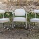 Set of 2 chairs and 1 armchair from the 70s in chrome metal and faux leather.