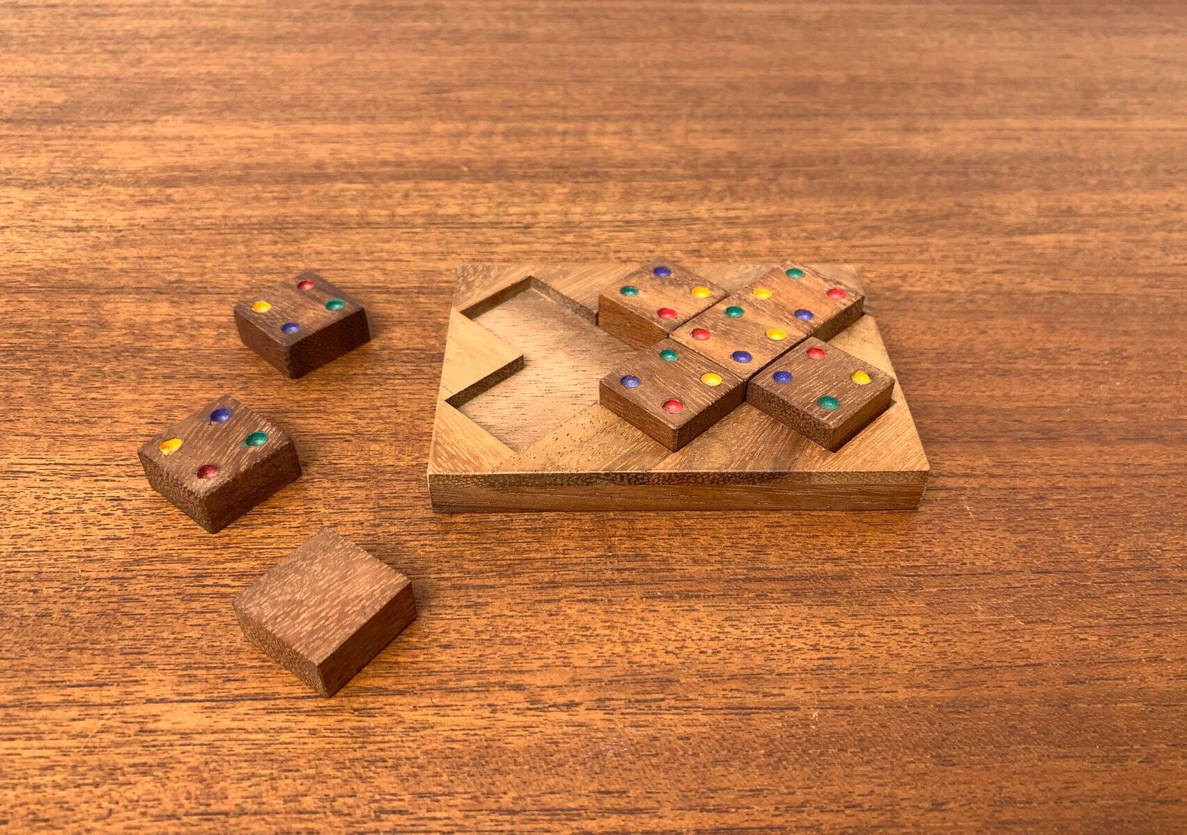 Mid-century Scandinavian teak dice game from the 1960s.