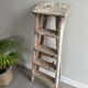 Former stepladder of patinated wood painter