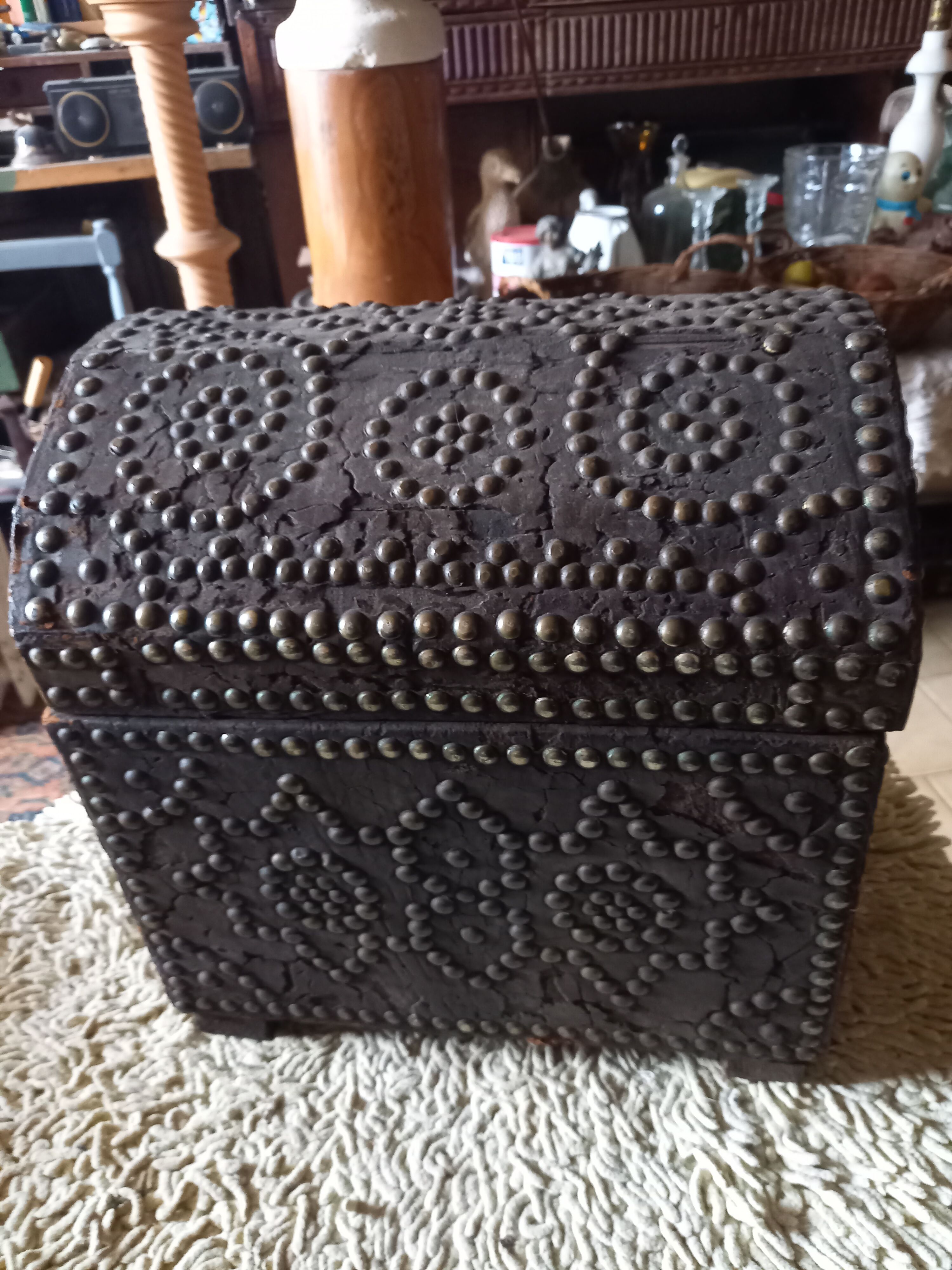 Old chest wood and studded leather