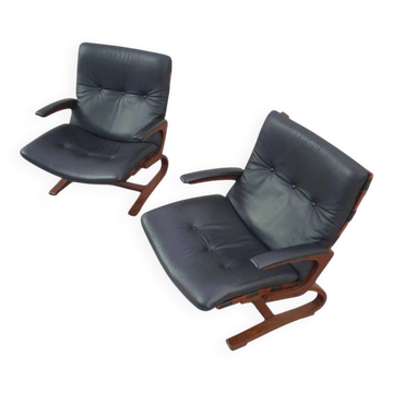 2 x leather lounge chairs