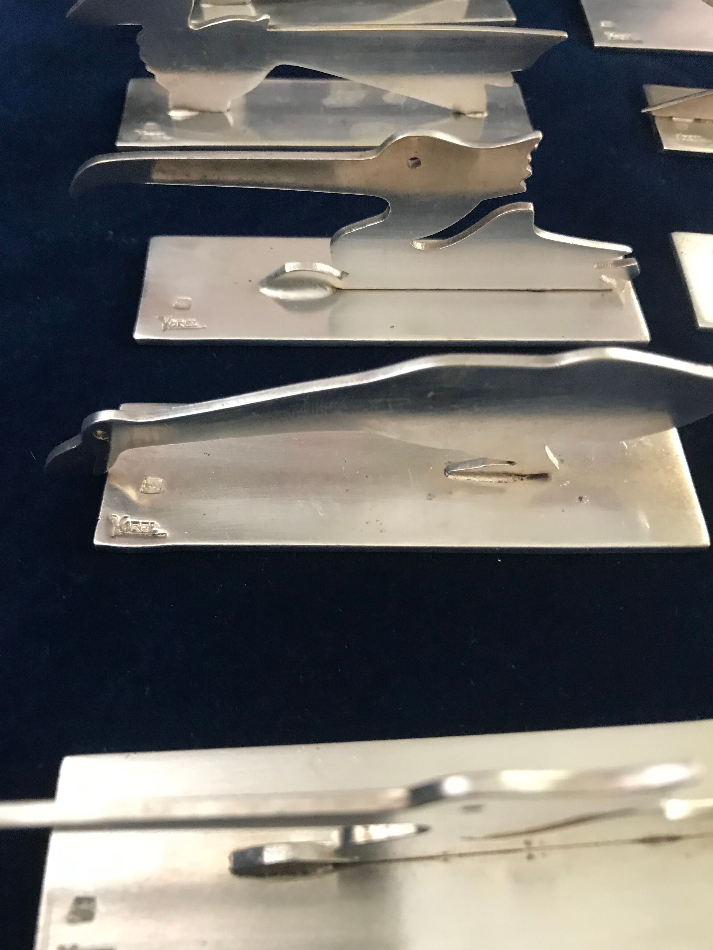 12 knife holders signed Yorel Art Deco