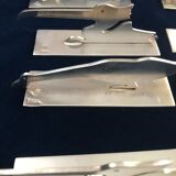 12 knife holders signed Yorel Art Deco