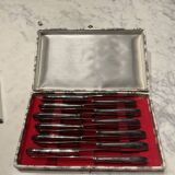 12 couteaux . métal argenté . art deco