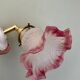 Vintage tulip-shaped lamp in frosted white and pink glass.