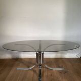 Modernist chrome and smoked glass table with tulip base from the 70s