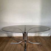 Table moderniste chrome et verre fumé piétement tulipe années 70