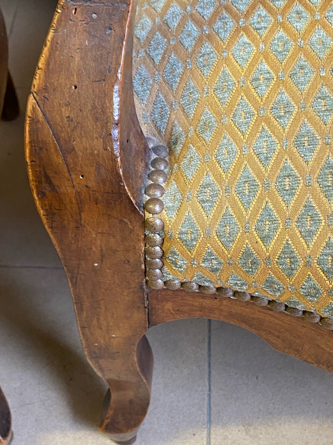 Two Louis XV style wooden and fabric armchairs