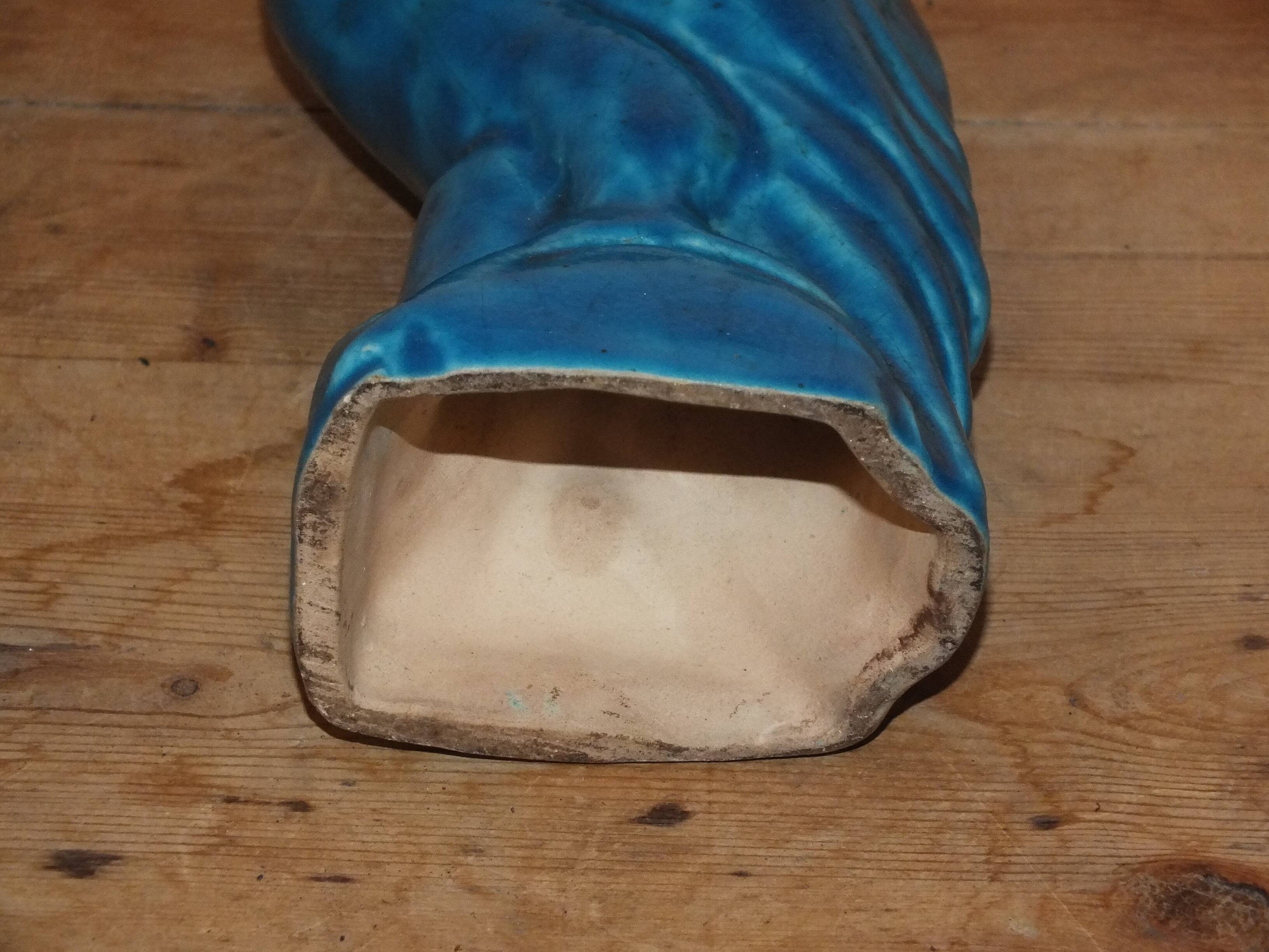 Bird, cracked blue raptor in ceramic