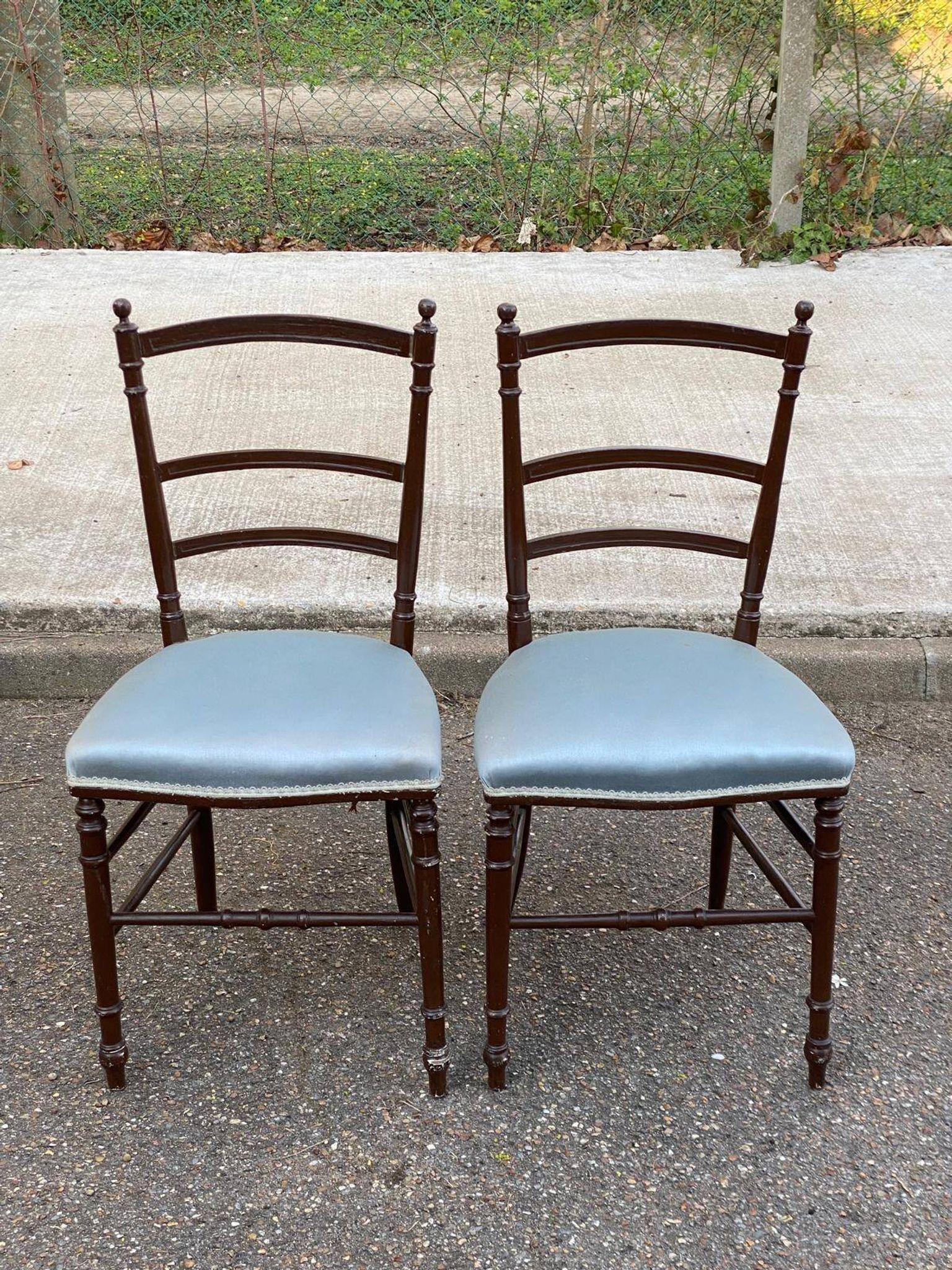 2 Napoleon III chairs in solid wood and blue satin fabric.