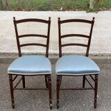 2 Napoleon III chairs in solid wood and blue satin fabric.