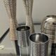 Series of 8 vintage candlesticks in silver metal