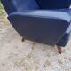 Paire de fauteuils des années 50 pieds compas recouverts de skaï bleu marine
