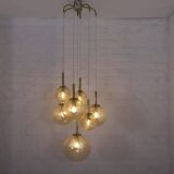 “Cascade” brass chandelier with amber globes