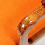 Vintage armchair in papaya orange wool from the 1960s.