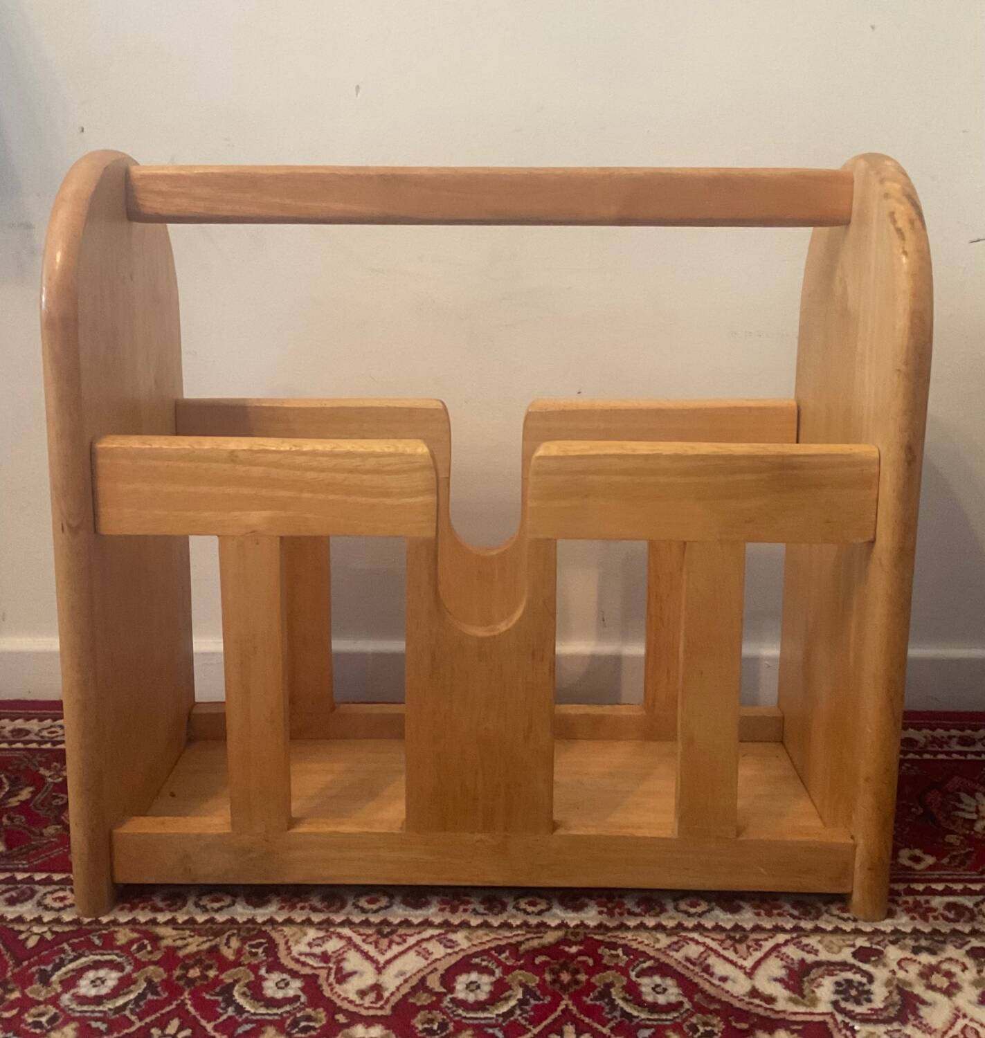Vintage magazine rack in blond wood
