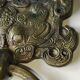 Ancient door knocker, taotié mask, shang dynasty. in bronze golden patina