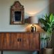 Antique brass repoussé mirror with wooden backing, 59x31 cm, C831.