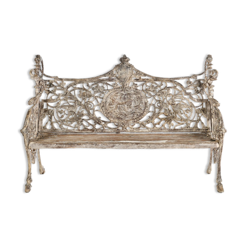 Sculpted cast iron bench and white patina wood