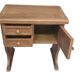 Table basse vintage en bois gain de place avec tiroirs et compartiment.