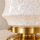Zoé — Table lamp in speckled white Clichy glass and gold brass.