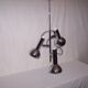 Suspension en inox Koch et Lowy des années 70