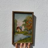 Small landscape painting with golden frame