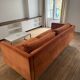 Orange velvet sofa