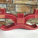 Former pair of burgundy ceramic candlesticks