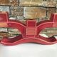 Former pair of burgundy ceramic candlesticks