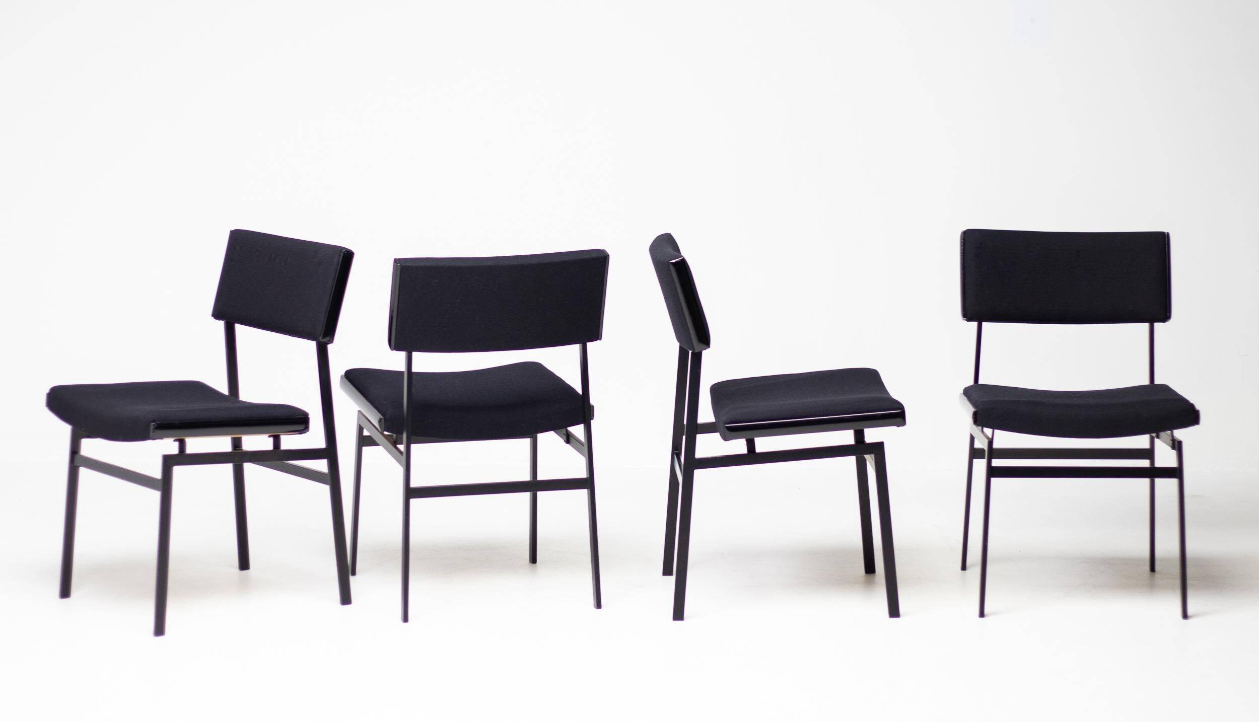 Set of four entirely black Hulmefa dining chairs, Architectural Modernism.