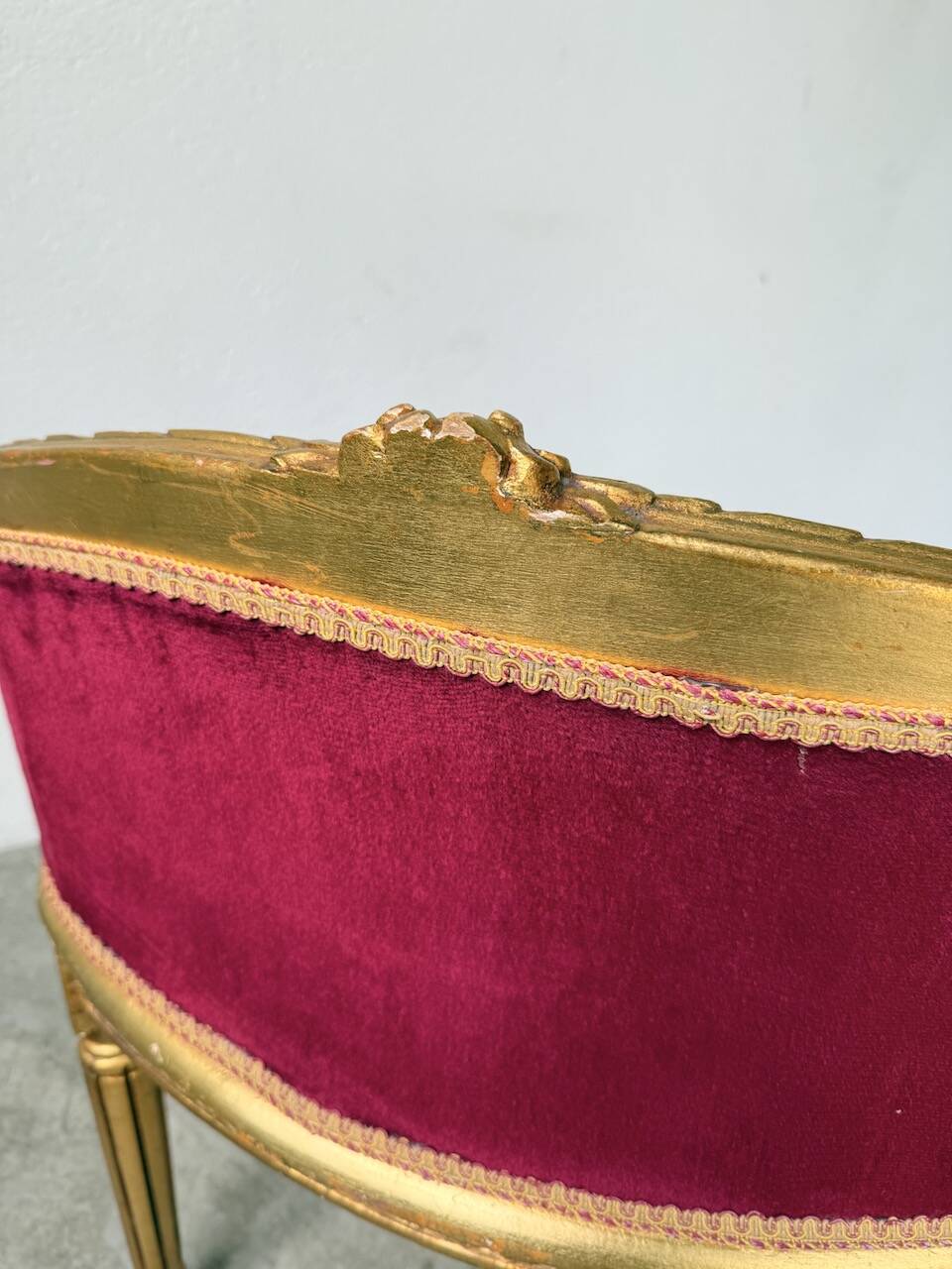 Louis XVI gilt wood and red velvet armchair