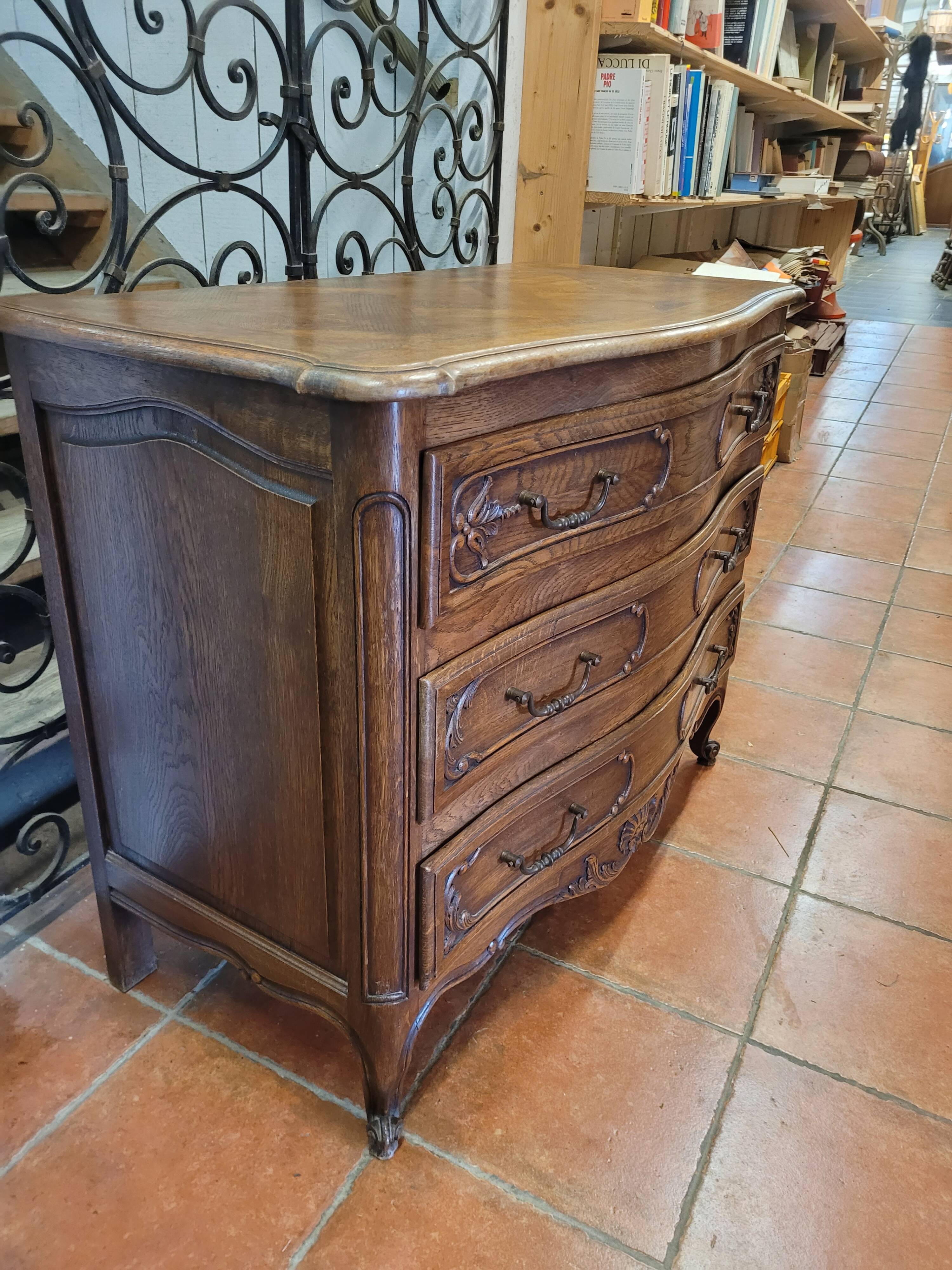 Curved oak chest of drawers in Louis XV style