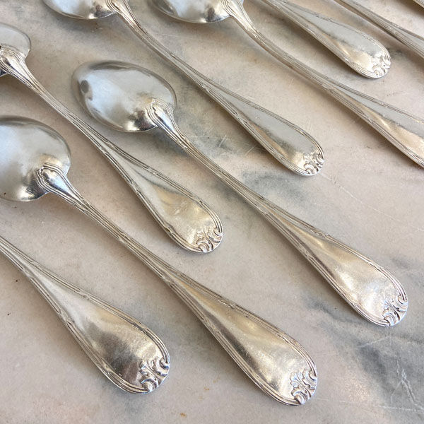 Series of 11 large old spoons, silver metal