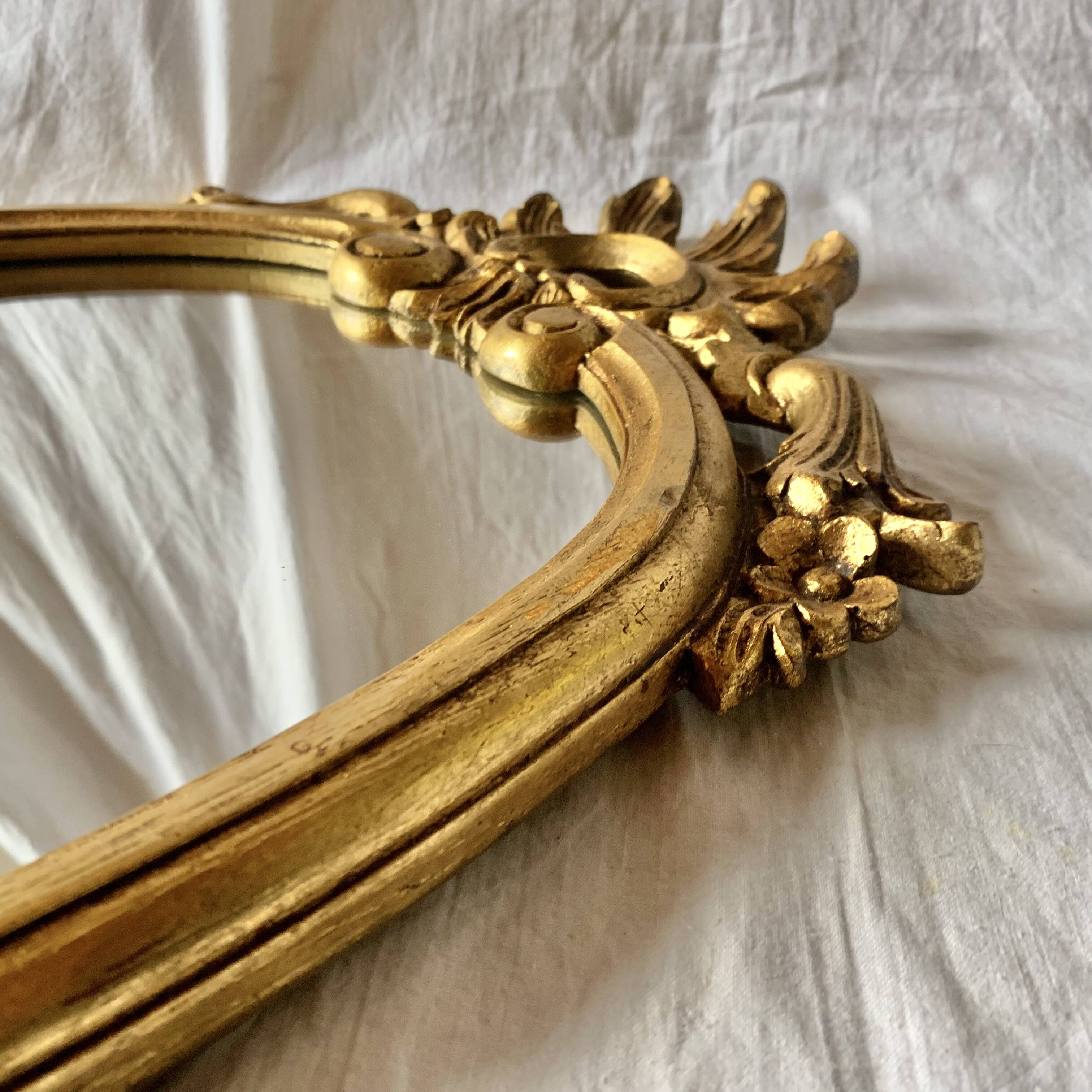 Baroque wall mirror in gilded plaster - height: 62 cm